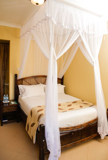 Cottage four-poster at Maya Nature Resort.