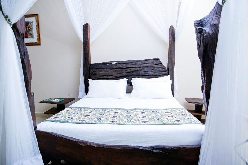 Four-poster bed at Maya Nature Resort.