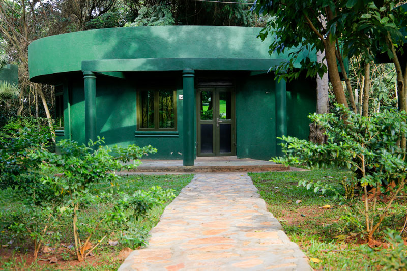 Cottage & garden path at Maya Nature Resort.