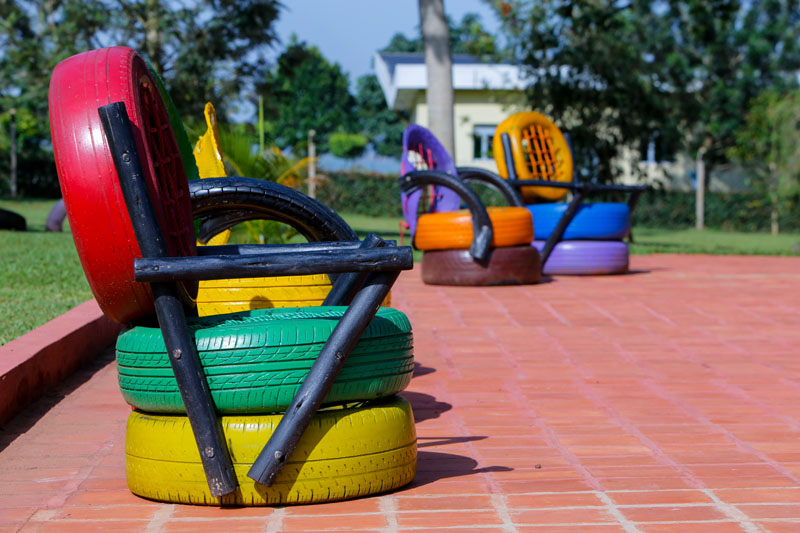 Colourful tyre seats at Maya Nature Resort.